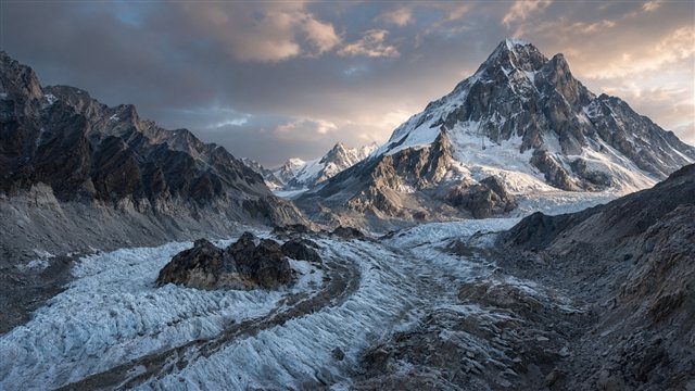 Thinning Himalayan glacier and exposed rock suggesting mountain warming